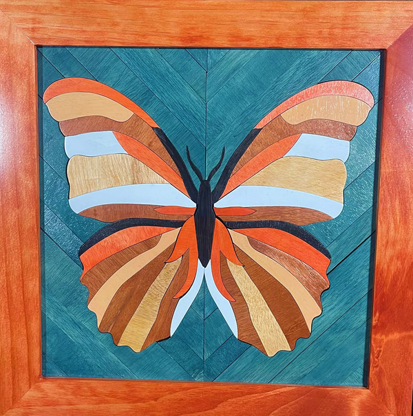 Framed wood quilt of butterfly