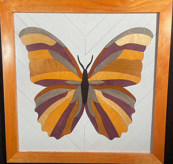 Framed wood quilt of butterfly