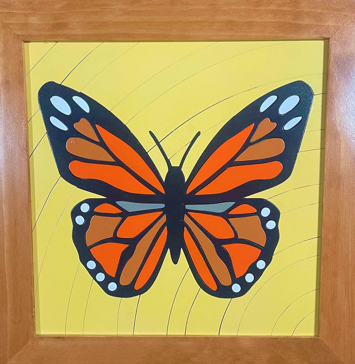 Framed wood quilt of butterfly
