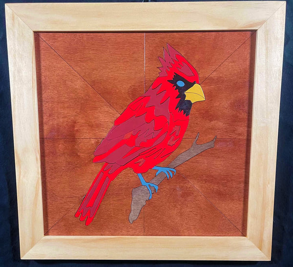 Framed wood quilt of a cardinal
