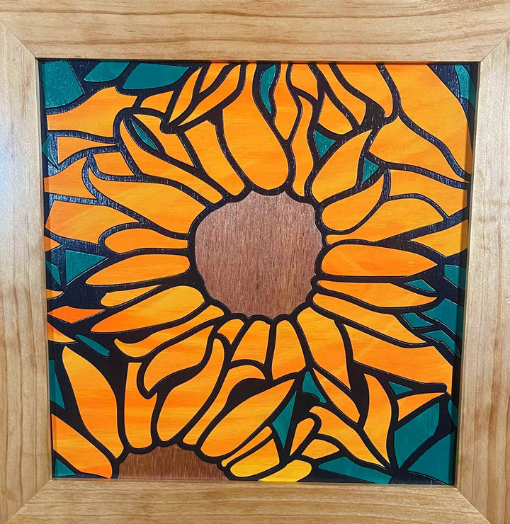 Framed wood quilt of sunflowers